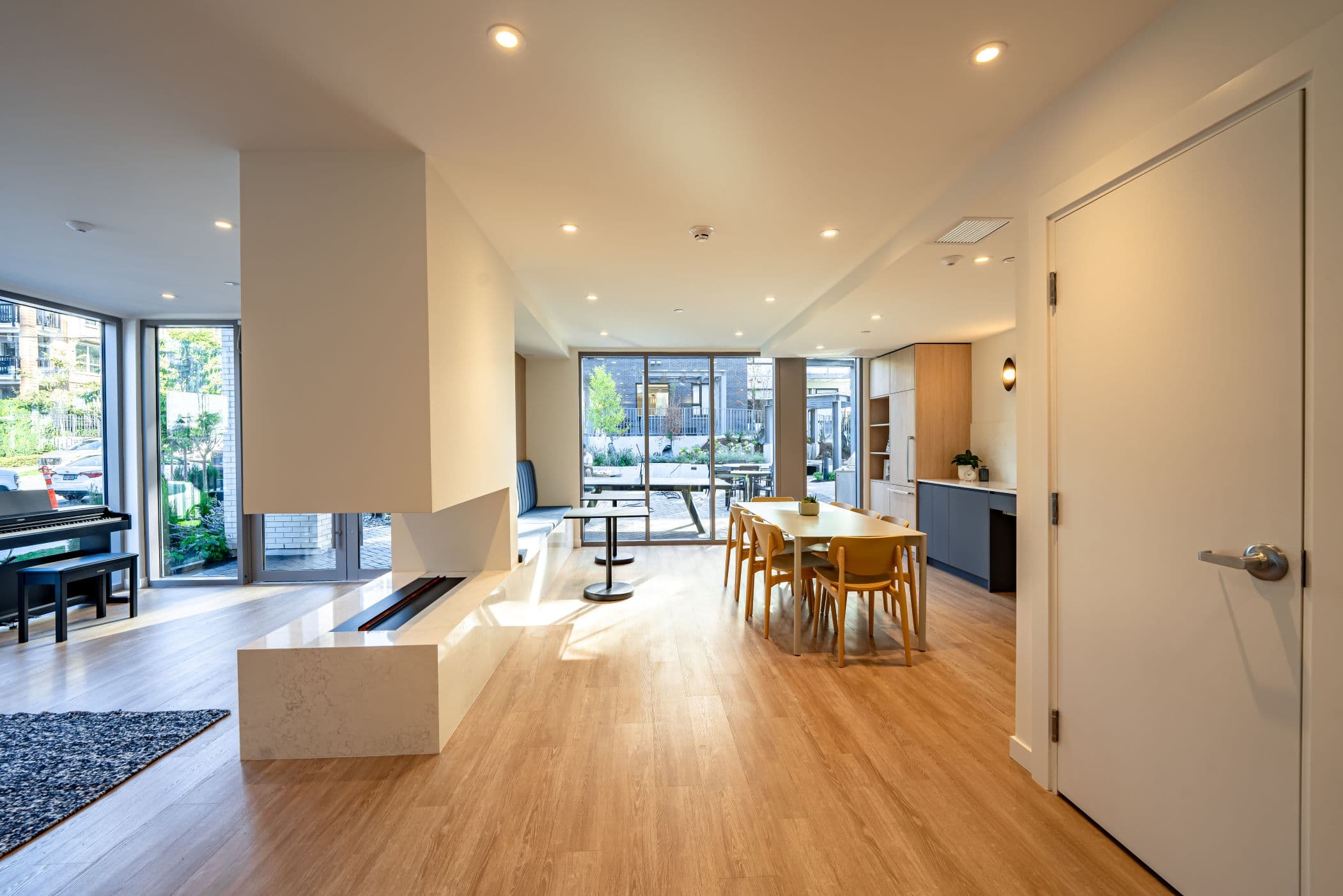 The resident lounge and dining space with its double-sided fireplace